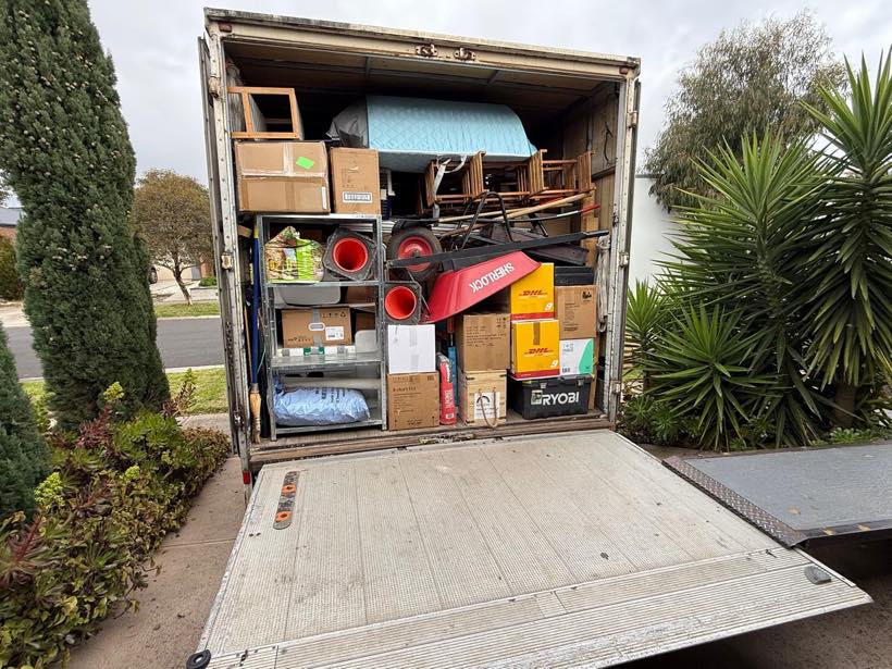 A Moving Folks truck neatly packed with a full household load